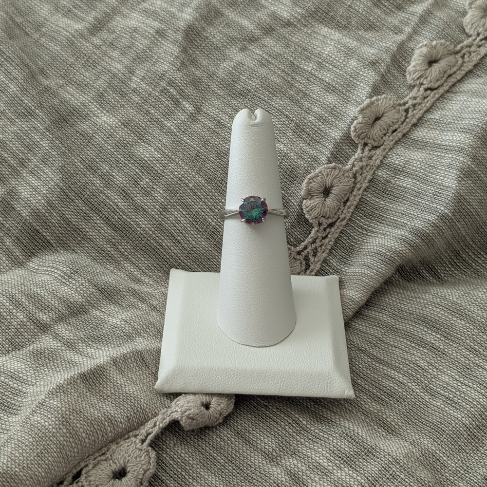 Elegant Silver Ring with Blue-Green Gemstone